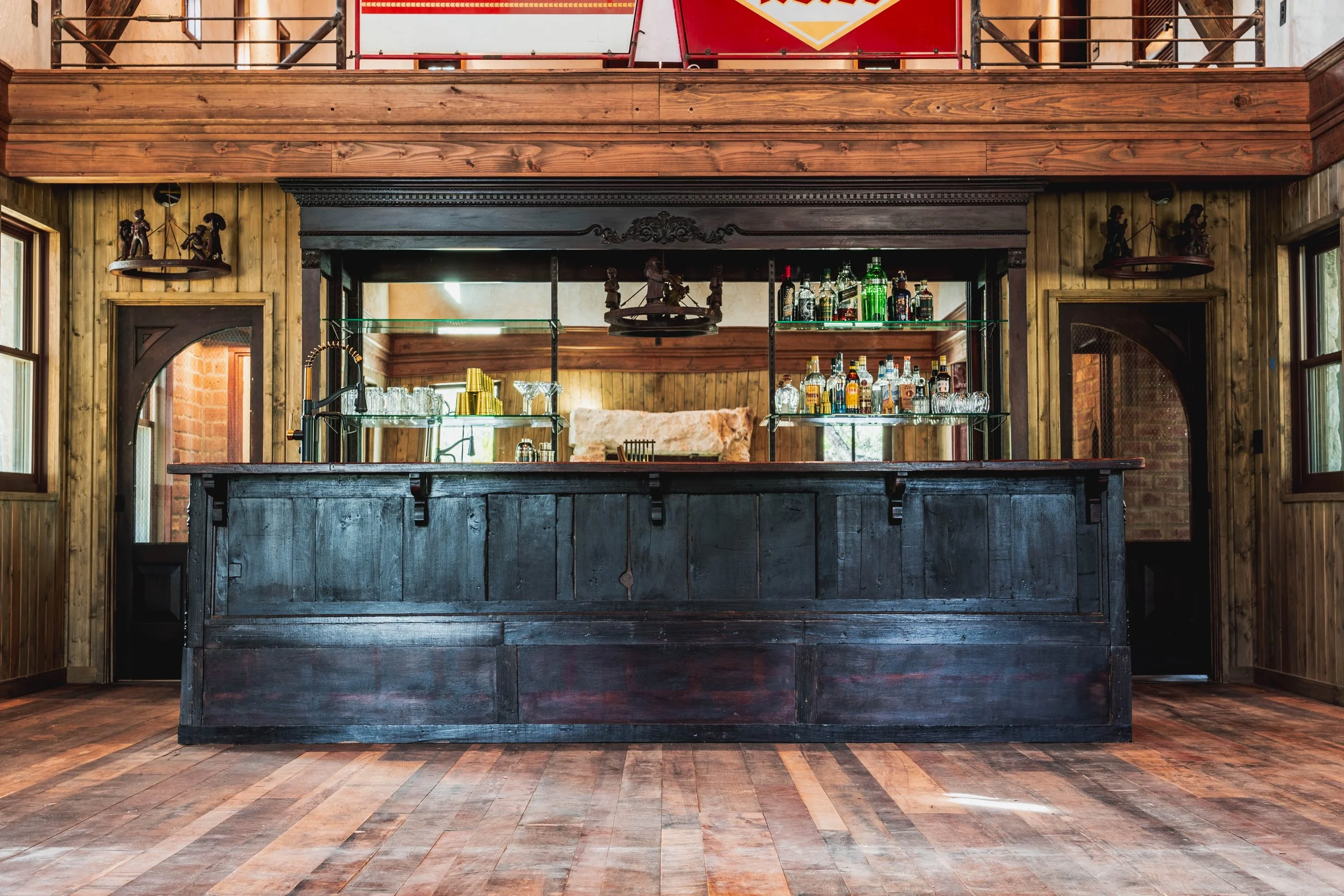 H2 Lodge interior with stone fireplace detail